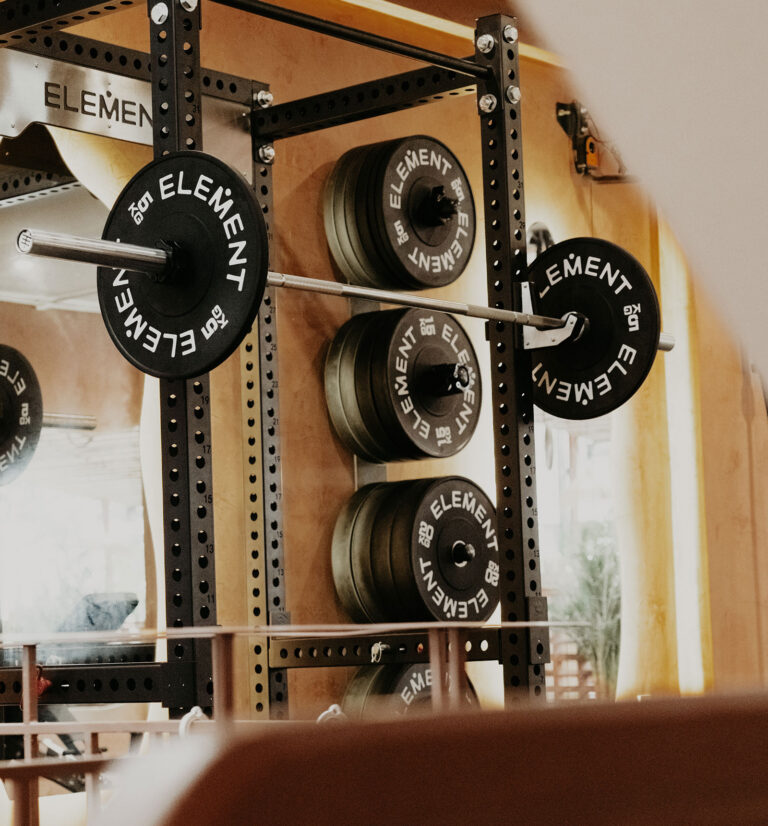 Squat rack at Element with a range of weights